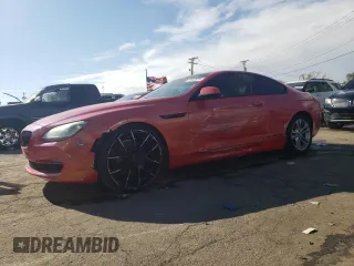 2012 BMW 6 Series 650i with VIN WBALX3C52CDV77849, listed as a Copart auction lot 77107074 with 0 mi miles and Salvage Title. Bid and sale history available at carsss.com. Image 1.