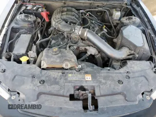 2012 Ford Mustang Premium z VIN 1ZVBP8AM6C5246219, wystawiony jako Copart lot #61443795 z przebiegiem 98 794 mil mil oraz Szkoda całkowita • Salvage title. Historia ofert i sprzedaży dostępna na DreamBid. Obrazek 11.