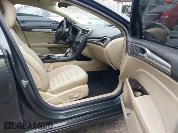 2015 Ford Fusion SE Hybrid with VIN 3FA6P0LU0FR242452, listed as a IAAI auction lot 41790218 with 163,741 mi miles. Bid and sale history available at carsss.com. Image 5.
