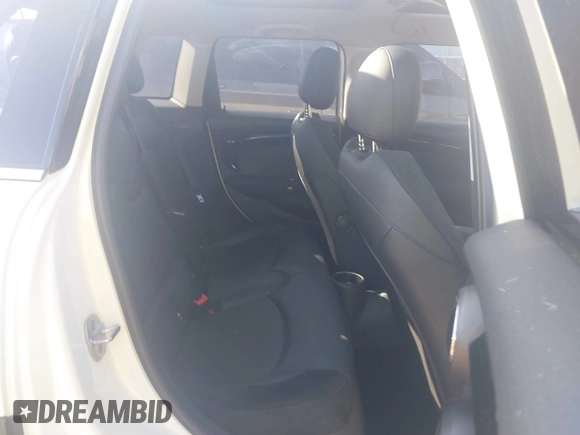 2021 MINI Hardtop 4 Door Cooper S with VIN WMWXU9C00M2P04693, listed as a IAAI auction lot 41785185 with 57,848 mi miles and . Bid and sale history available at DreamBid. Image 8.