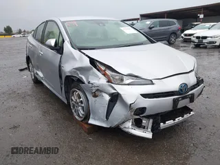 2022 Toyota Prius L Eco with VIN JTDKAMFU1N3177055, listed as a IAAI auction lot 41506862 with 121,318 mi miles and . Bid and sale history available at DreamBid. Image 6.
