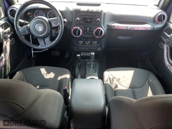 2018 Jeep Wrangler JK Unlimited Sport S with VIN 1C4BJWDGXJL911081, listed as a Copart auction lot 69205464 with 117,576 mi miles and Salvage Title. Bid and sale history available at carsss.com. Image 8.
