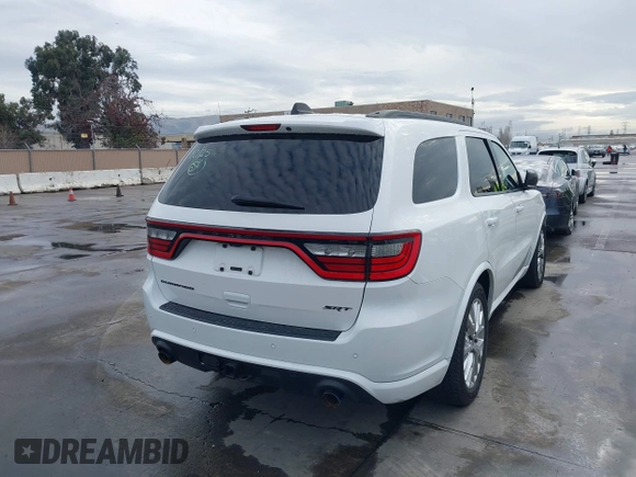 2018 Dodge Durango SRT with VIN 1C4SDJGJ5JC262338, listed as a IAAI auction lot 41106320 with 89,046 mi miles and . Bid and sale history available at DreamBid. Image 4.
