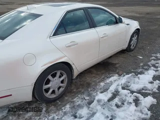 2009 Cadillac CTS AWD w/1SA with VIN 1G6DG577990169317, listed as a IAAI auction lot 41450158 with 144,768 mi miles. Bid and sale history available at carsss.com. Image 6.