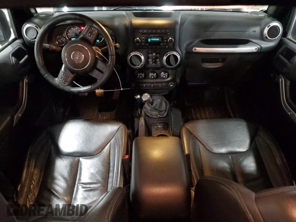 2015 Jeep Wrangler Unlimited Sahara with VIN 1C4BJWEG5FL611521, listed as a Copart auction lot 50609985 with 207,473 mi miles and Salvage Title. Bid and sale history available at carsss.com. Image 8.