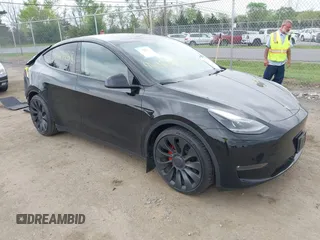 2023 Tesla Model Y Performance z VIN 7SAYGDEF7PF663387, wystawiony jako IAAI lot #42129258 z przebiegiem 42 691 mil mil oraz . Historia ofert i sprzedaży dostępna na DreamBid. Obrazek 1.