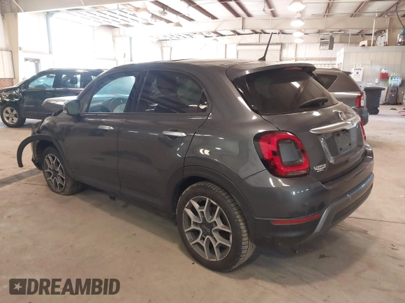 2021 FIAT 500X Trekking with VIN ZFBNF3B17MP909591, listed as a IAAI auction lot 41256551 with 58,688 mi miles and . Bid and sale history available at DreamBid. Image 3.