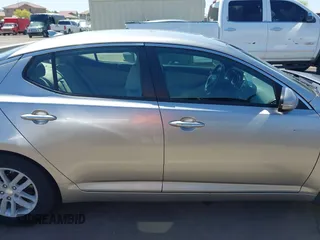 2013 Kia Optima LX with VIN KNAGM4A74D5423255, listed as a IAAI auction lot 42065230 with 116,589 mi miles. Bid and sale history available at carsss.com. Image 13.