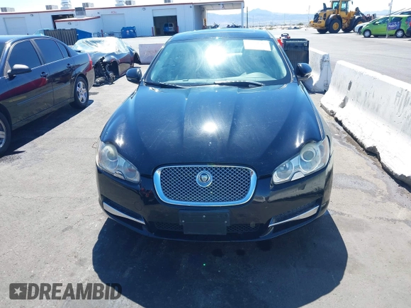 2010 Jaguar XF Premium Luxury with VIN SAJWA0GB3ALR49414, listed as a IAAI auction lot 41880567 with 132,230 mi miles. Bid and sale history available at carsss.com. Image 6.