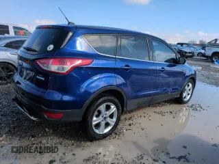 2014 Ford Escape SE with VIN 1FMCU0GX3EUC52325, listed as a Copart auction lot 46494755 with 147,165 mi miles and Salvage Title. Bid and sale history available at DreamBid. Image 3.