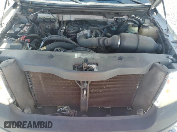 2005 Ford F-150 XL with VIN 1FTRF12225NC03167, listed as a Copart auction lot 61046445 with 153,050 mi miles and Salvage title. Bid and sale history available at DreamBid. Image 11.