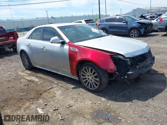 2012 Cadillac CTS Performance z VIN 1G6DJ5E31C0101165, wystawiony jako IAAI lot #42314189 z przebiegiem 157 313 mil mil oraz . Historia ofert i sprzedaży dostępna na DreamBid. Obrazek 1.