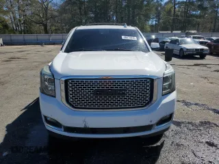 2015 GMC Yukon Denali with VIN 1GKS1CKJ9FR566390, listed as a Copart auction lot 48472835 with 167,719 mi miles and Salvage Title. Bid and sale history available at carsss.com. Image 5.