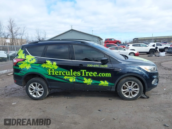 2018 Ford Escape SEL with VIN 1FMCU9HD2JUD30385, listed as a IAAI auction lot 41919203 with 160,868 mi miles. Bid and sale history available at carsss.com. Image 13.