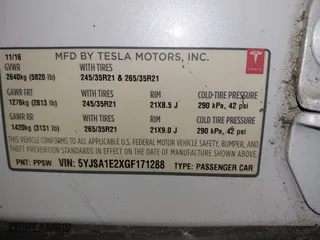 2016 Tesla Model S 90D with VIN 5YJSA1E2XGF171288, listed as a IAAI auction lot 41766075 with 112,927 mi miles. Bid and sale history available at carsss.com. Image 9.