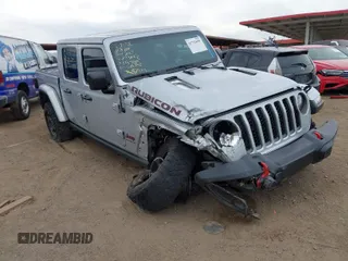 2023 Jeep Gladiator Rubicon with VIN 1C6JJTBG9PL524342, listed as a IAAI auction lot 41732659 with 69,537 mi miles. Bid and sale history available at carsss.com. Image 1.