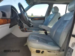 1993 BMW 7 Series with VIN WBAGD4323PDE63700, listed as a Copart auction lot 79675024 with 248,056 mi miles and Clean title. Bid and sale history available at DreamBid. Image 7.