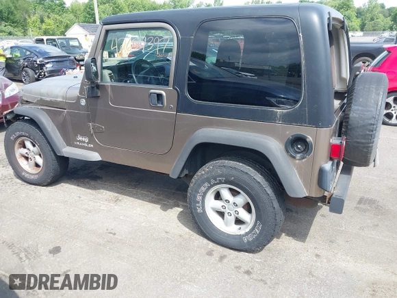 2005 Jeep Wrangler Sport with VIN 1J4FA49SX5P317120, listed as a IAAI auction lot 42677397 with 71,403 mi miles and . Bid and sale history available at DreamBid. Image 14.