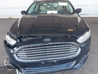 2014 Ford Fusion Titanium with VIN 3FA6P0K97ER328482, listed as a IAAI auction lot 40252350 with 137,128 mi miles. Bid and sale history available at carsss.com. Image 12.