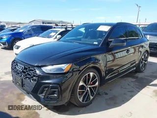 2021 Audi SQ5 Premium Plus z VIN WA1B4AFY1M2001646, wystawiony jako IAAI lot #42227378 z przebiegiem 48 525 mil mil oraz . Historia ofert i sprzedaży dostępna na DreamBid. Obrazek 2.