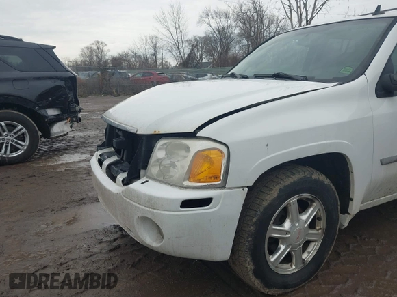 2008 GMC Envoy SLE2 with VIN 1GKDT13S582112468, listed as a IAAI auction lot 41686605 with 215,163 mi miles. Bid and sale history available at carsss.com. Image 6.