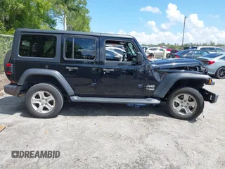 2020 Jeep Wrangler Unlimited Sport S z VIN 1C4HJXDN1LW223664, wystawiony jako IAAI lot #41886832 z przebiegiem 77 019 mil mil oraz . Historia ofert i sprzedaży dostępna na DreamBid. Obrazek 14.