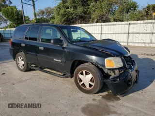 2003 GMC Envoy SLE with VIN 1GKDS13S232329083, listed as a Copart auction lot 73147534 with 212,645 mi miles and Salvage Title. Bid and sale history available at DreamBid. Image 4.
