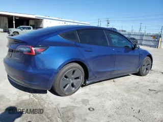 2021 Tesla Model 3 Long Range with VIN 5YJ3E1EBXMF925147, listed as a Copart auction lot 49741275 with 106,947 mi miles and Salvage Title. Bid and sale history available at DreamBid. Image 3.