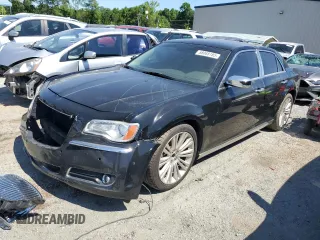 2014 Chrysler 300 C with VIN 2C3CCAEG1EH161772, listed as a Copart auction lot 58068185 with 123,553 mi miles and Salvage title. Bid and sale history available at DreamBid. Image 1.