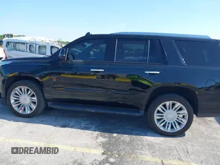 2020 Cadillac Escalade Luxury z VIN 1GYS4BKJ9LR287363, wystawiony jako IAAI lot #42323765 z przebiegiem 44 057 mil mil oraz . Historia ofert i sprzedaży dostępna na DreamBid. Obrazek 14.