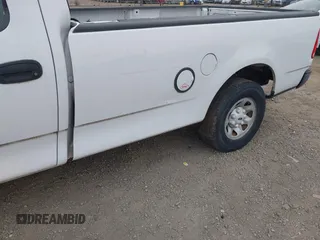 2002 Ford F-150 XL with VIN 2FTPF17Z72CA54365, listed as a IAAI auction lot 42079087 with Not provided miles and . Bid and sale history available at DreamBid. Image 11.