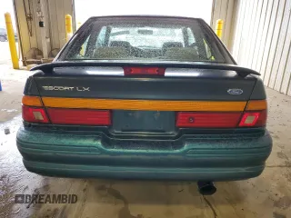 1996 Ford Escort z VIN 1FASP11J0TW123967, wystawiony jako Copart lot #52859835 z przebiegiem 164 693 mil mil oraz Szkoda całkowita • Salvage title. Historia ofert i sprzedaży dostępna na DreamBid. Obrazek 6.