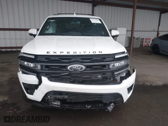 2023 Ford Expedition Limited with VIN 1FMJU2A89PEA47772, listed as a IAAI auction lot 41242800 with 14,512 mi miles. Bid and sale history available at carsss.com. Image 12.