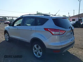 2013 Ford Escape SE with VIN 1FMCU9GX5DUD34978, listed as a IAAI auction lot 42570946 with 133,408 mi miles and . Bid and sale history available at DreamBid. Image 3.
