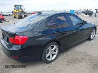 2013 BMW 3 Series 328i with VIN WBA3C1C5XDF444200, listed as a IAAI auction lot 42204600 with 113,274 mi miles and . Bid and sale history available at carsss.com. Image 4.