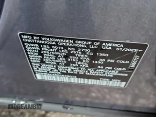 2023 Volkswagen Atlas SE z VIN 1V2HR2CA5PC526012, wystawiony jako IAAI lot #42796408 z przebiegiem 41 216 mil mil oraz . Historia ofert i sprzedaży dostępna na DreamBid. Obrazek 50.