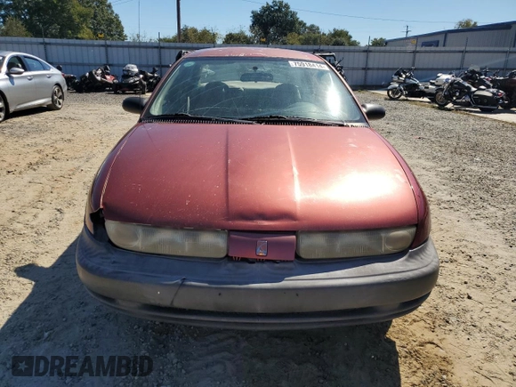 1998 Saturn SL z VIN 1G8ZH528XWZ144301, wystawiony jako Copart lot #75918414 z przebiegiem 219 256 mil mil oraz Szkoda całkowita • Salvage title. Historia ofert i sprzedaży dostępna na DreamBid. Obrazek 5.