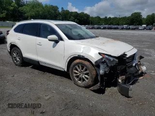 2019 Mazda CX-9 Touring z VIN JM3TCBCY9K0305038, wystawiony jako Copart lot #56707735 z przebiegiem 76 546 mil mil oraz Szkoda całkowita • Salvage title. Historia ofert i sprzedaży dostępna na DreamBid. Obrazek 4.