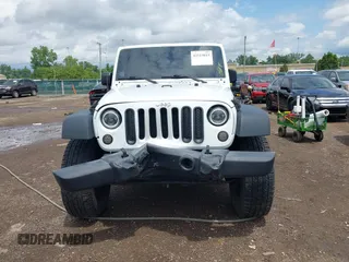 2016 Jeep Wrangler Black Bear with VIN 1C4AJWAG7GL106809, listed as a IAAI auction lot 42513015 with 86,730 mi miles and . Bid and sale history available at DreamBid. Image 12.