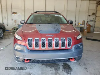 2015 Jeep Cherokee Trailhawk with VIN 1C4PJMBS1FW745928, listed as a Copart auction lot 62032585 with 132,559 mi miles and Salvage title. Bid and sale history available at DreamBid. Image 5.