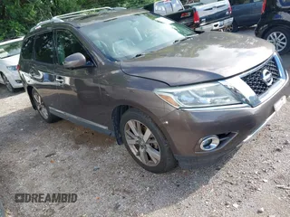 2015 Nissan Pathfinder Platinum with VIN 5N1AR2MM4FC603779, listed as a IAAI auction lot 42731531 with 103,385 mi miles and . Bid and sale history available at DreamBid. Image 1.
