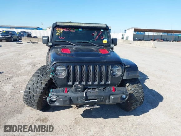 2018 Jeep Wrangler Unlimited Rubicon z VIN 1C4HJXFGXJW108766, wystawiony jako IAAI lot #41846062 z przebiegiem 96 791 mil mil oraz . Historia ofert i sprzedaży dostępna na DreamBid. Obrazek 13.
