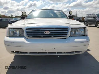 1999 Ford Crown Victoria Police with VIN 2FAFP71WXXX198735, listed as a Copart auction lot 70526134 with 116,889 mi miles and Clean Title. Bid and sale history available at carsss.com. Image 5.