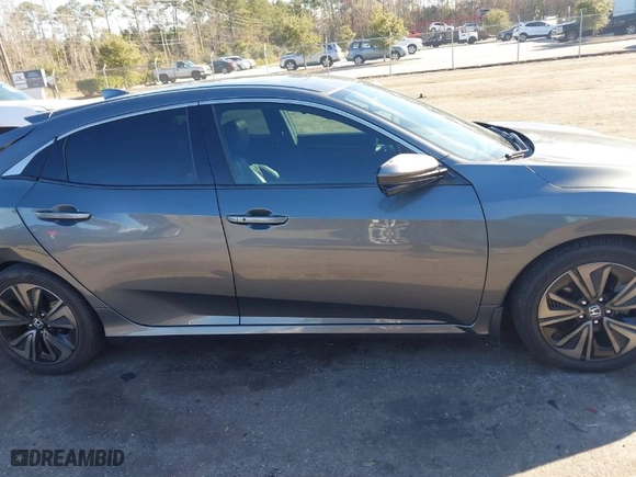 2017 Honda Civic Hatchback EX-L Navi with VIN SHHFK7H79HU208310, listed as a IAAI auction lot 41362349 with 52,740 mi miles. Bid and sale history available at carsss.com. Image 13.