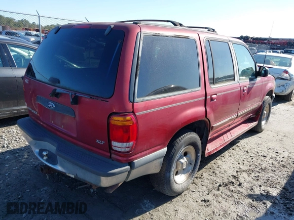 1998 Ford Explorer XL z VIN 1FMZU34X2WZA20335, wystawiony jako IAAI lot #41077333 z przebiegiem 183 565 mil mil oraz . Historia ofert i sprzedaży dostępna na DreamBid. Obrazek 4.