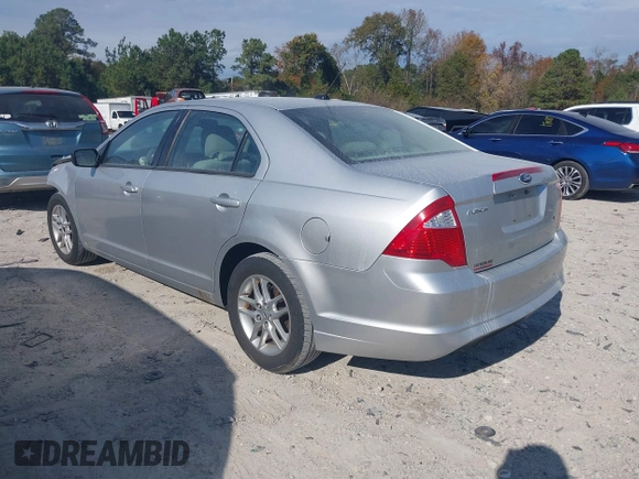 2012 Ford Fusion S with VIN 3FAHP0GA0CR315999, listed as a IAAI auction lot 40937858 with 164,719 mi miles. Bid and sale history available at carsss.com. Image 3.
