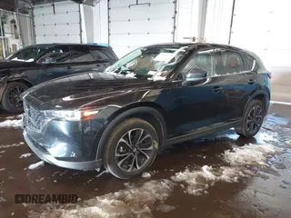 2023 Mazda CX-5 S Premium with VIN JM3KFBDM6P0100301, listed as a IAAI auction lot 41548310 with 21,722 mi miles and . Bid and sale history available at carsss.com. Image 17.