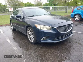 2016 Mazda 6 i Touring with VIN JM1GJ1V50G1428709, listed as a IAAI auction lot 42201652 with 60,063 mi miles and . Bid and sale history available at DreamBid. Image 1.