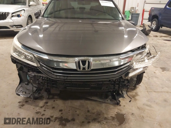 2016 Honda Accord Touring with VIN 1HGCR3F92GA029435, listed as a IAAI auction lot 42180794 with 132,658 mi miles and . Bid and sale history available at DreamBid. Image 6.