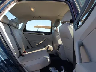 2018 Volkswagen Passat SE z VIN 1VWBA7A3XJC038887, wystawiony jako IAAI lot #42084936 z przebiegiem 62 857 mil mil oraz . Historia ofert i sprzedaży dostępna na DreamBid. Obrazek 8.